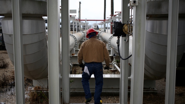 A contractor works at Bryan Mound Strategic Petroleum Reserve in Freeport, Texas. Photographer: Luke Sharrett/Bloomberg
    
    
    