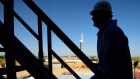 The silhouette of a contractor is seen walking up stairs at an Anadarko Petroleum Corp. oil rig site in Fort Lupton, Colorado, U.S., on Tuesday, Aug. 12, 2014. U.S. crude oil inventories rose by 1.4 million barrels in the week ended Aug. 8, to 367 million, compared with the consensus-estimated draw of 1.6 million. 