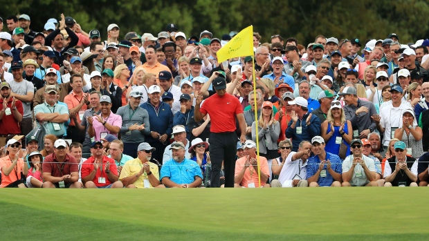 AUGUSTA, GEORGIA - APRIL 14: Tiger Woods of the United States reacts to his putt on the ninth green during the final round of the Masters at Augusta National Golf Club on April 14, 2019 in Augusta, Georgia. (Photo by Mike Ehrmann/Getty Images) 
