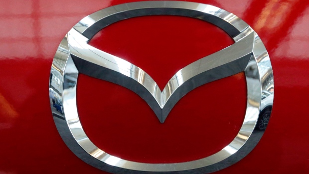 The Mazda logo is seen on the trunk of a Mazda vehicle on display at the Pittsburgh Auto Show on Feb