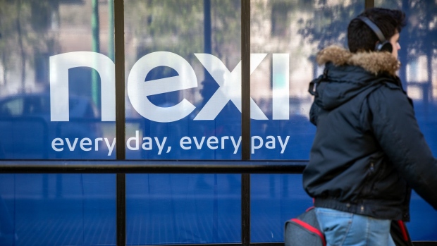 The Nexi SpA headquarters stand in Milan, Italy, on Monday, April 15, 2019. The initial public offering of payment-service company Nexi raised 2.01 billion euros ($2.3 billion), making it the biggest listing in Europe so far this year and the third major IPO of a payment-processing institution in the region in less than a year. 
