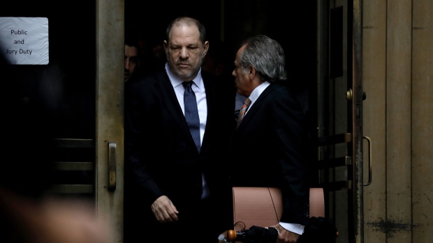 Harvey Weinstein, left, exits state supreme court with attorney Benjamin Brafman in New York on Oct. 11, 2018.