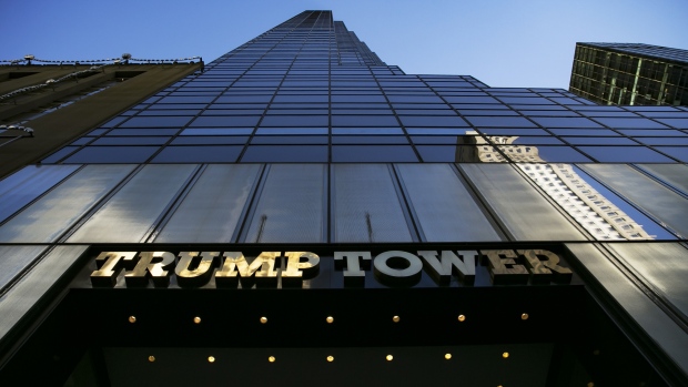 Signage is displayed outside Trump Tower in New York, U.S., on Wednesday, Dec. 19, 2018.  Photographer: Allison Joyce/Bloomberg