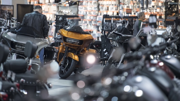 A customer looks at motorcycles on display at the Oakland Harley-Davidson dealership in Oakland, California, U.S., on Friday, April 14, 2017. Harley-Davidson Inc. is scheduled to release earnings figures on April 18. 