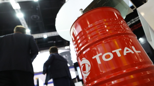 The logo of Total SA sits on an oil drum in the corporate hall at the St Petersburg International Economic Forum (SPIEF) in Saint Petersburg, Russia, on Thursday, May 24, 2018. The economic forum this year will be attended by President Vladimir Putin and French President Emmanuel Macron, and panels include everything from how to do business in Russia to biotechnology and blockchain. 