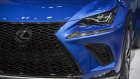 A Toyota Motor Corp. Lexus badge is seen on the front grille of a NX compact crossover vehicle at th