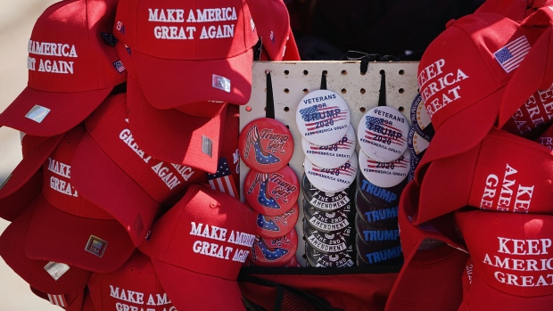 GRAND RAPIDS, MICHIGAN - MARCH 28: A vendor sells merchandise before the start of a rally with President Donald Trump at the Van Andel Arena on March 28, 2019 in Grand Rapids, Michigan. Grand Rapids was the final city Trump visited during his 2016 campaign. (Photo by Scott Olson/Getty Images)