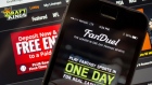 The FanDuel Inc. app and DraftKings Inc. website are arranged for a photograph in Washington, D.C., U.S. 