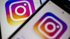 Facebook Inc.'s Instagram logo is displayed on the Instagram application on an Apple Inc. iPhone in this arranged photograph taken in Washington, D.C., U.S. 