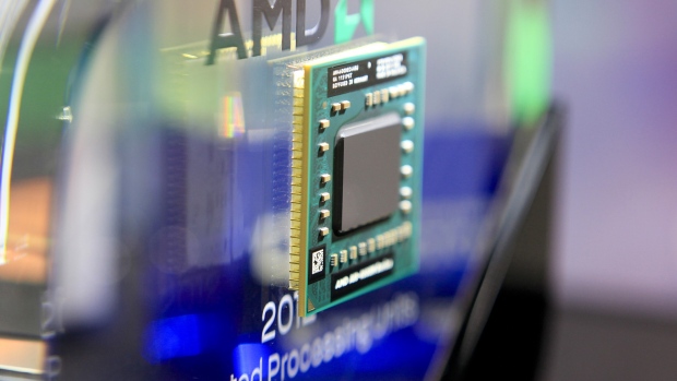 An Advanced Micro Devices Inc. AMD-A10-4600M Series APU computer chip is displayed at the AMD booth at Computex Taipei 2012 in Taipei, Taiwan. 