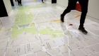 A Google Inc. Maps display of Washington D.C. lines the floor next to the elevators at the Google office in Washington, D.C., July 15, 2014. 