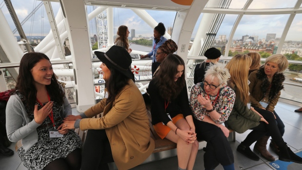 LONDON, ENGLAND - OCTOBER 11: Inspirational women from various walks of life take part in a mentoring session in a London Eye pod with 6th form girls from Gumley House Convent School in Isleworth on October 11, 2013 in London, England. The session was part of a global event to mark the UN International day of the Girl. (Photo by Dan Kitwood/Getty Images)