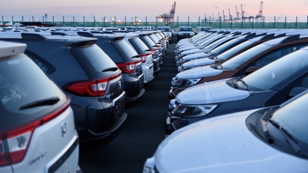 Toyota Motor Corp. vehicles and Honda Motor Co. sport utility vehicles (SUV), foreground, bound for shipment sit at a port in Yokohama, Japan, on Monday, Feb. 18, 2019. Japan is sticking to its view that the U.S. won’t apply higher tariffs on imports of Japanese cars and auto parts so long as negotiations toward a trade deal continue, according to Tokyo’s lead negotiator with Washington. Negotiations over a trade deal announced last September by Trump and Abe have yet to start, partly due to ongoing talks between Washington and Beijing. 