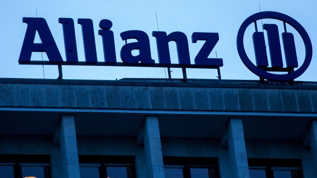 The Allianz SE logo sits on a top of a building in Berlin, Germany, on Wednesday, Jan. 4, 2017. 