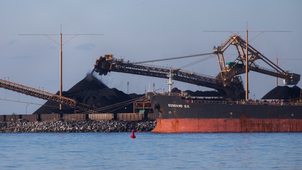 A conveyor moves coal into a pile at the Westshore Terminals Ltd. export terminal in Delta, British Columbia, Canada, on Wednesday, Feb. 6, 2019. 