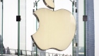 The Apple Inc. logo is displayed above a store entrance in Shanghai, China, on Thursday, May 9, 2019. 