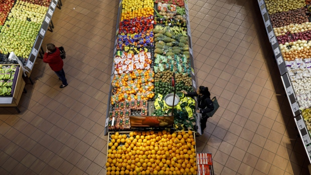 Shoppers browse produce at a Loblaw grocery store in Toronto, Ontario, April 30, 2019. 