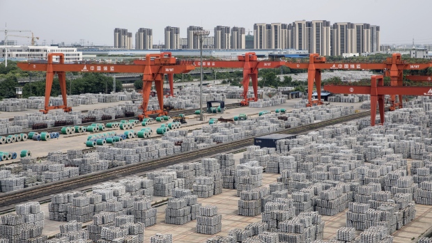 Bundles of aluminum ingots sit stacked at a China National Materials Storage and Transportation Corp. stockyard in Wuxi, China, on Wednesday, May 8, 2019. An unexpected fall in China’s exports and an equally unforeseen rise in imports show that the world’s second-largest economy continues a tentative recovery while global demand weakens and trade tensions re-escalate. 