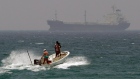 Fishermen cross the sea waters off Fujairah, United Arab Emirates, near the Strait of Hormuz. 