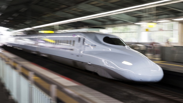A West Japan Railway Co. N700A Shinkansen bullet train travels through Shin-Kobe station in Kobe, Hyogo, Japan, on Saturday, Oct. 14, 2017. 