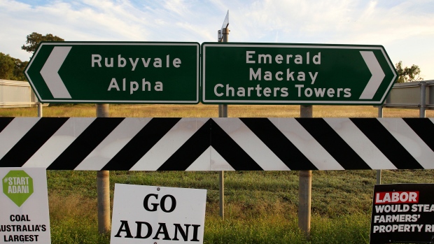 CLERMONT, AUSTRALIA - APRIL 29: Pro-Adani signs are seen on the road side at the Clermont township turn-off on April 29, 2019 in Clermont, Australia. Former Greens leader and conservationist, Bob Brown, has been leading a convoy of environmental activists through the Southern States towards Central Queensland as part of the #StopAdani movement. With primary concerns for increased coal ship travel through the Great Barrier Reef World Heritage Area, unlocking of the Galilee Basin and increase in carbon pollution. The proposed Adani Carmichael Mine, if approved will be constructed in the North Galilee Basin, 160kms north-west of regional town Clermont, its first stage is estimated to produce 27.5 million tonnes of coal per annum and will be transported via rail to Abbot Point which is situated 25km north of Bowen. (Photo by Lisa Maree Williams/Getty Images) 