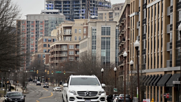 Residential and commercial buildings stand along Wilson Blvd. near the Clarendon neighborhood of Arlington, Virginia, U.S., on Friday, Feb. 22, 2019. In the 13 months through January, JPMorgan has applied to open 185 new branches, with 71 percent of them in more affluent areas. The bank in that time has given notice to regulators of its intention to shut 187 branches. 