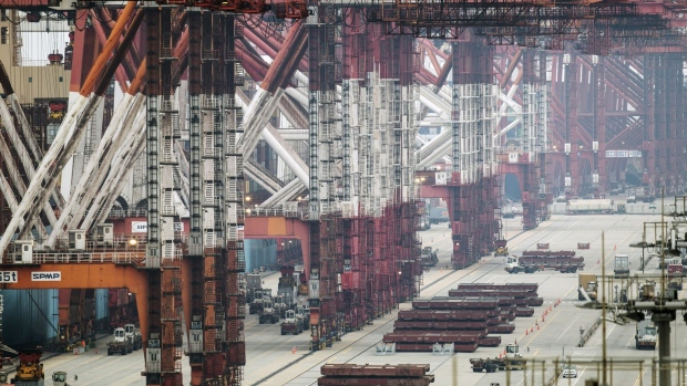 Gantry cranes stand at the Yangshan Deepwater Port, operated by Shanghai International Port Group Co. (SIPG), in Shanghai, China, on Friday, May 10, 2019. The U.S. hiked tariffs on more than $200 billion in goods from China on Friday in the most dramatic step yet of President Donald Trump's push to extract trade concessions, deepening a conflict that has roiled financial markets and cast a shadow over the global economy. 