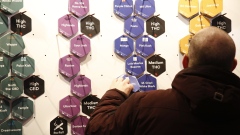 Cards for different kinds of cannabis products are displayed on a wall at the Fire & Flower cannabis shop in Ottawa, Ontario, Canada, on Monday, April 1, 2019. Canada's most populous province will finally open its first pot shops, nearly six months after legalization. Only 10 stores in Ontario had received the necessary licenses to open on April 1. 