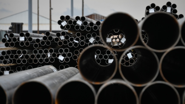 Steel pipes sit stacked at the Port of Houston in Houston, Texas, U.S., on Friday, April 12, 2019. The U.S. Census is scheduled to release trade balance figures on April 17. 