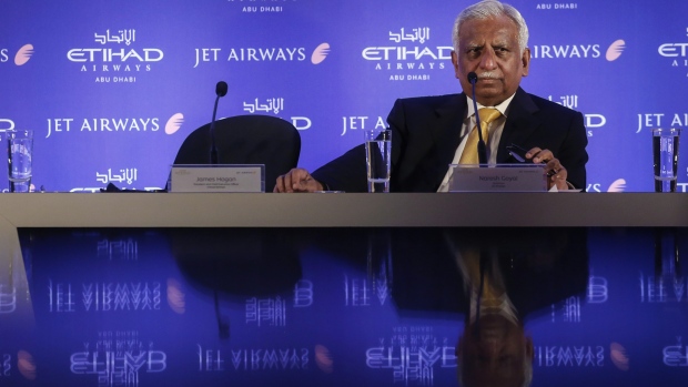 Naresh Goyal, chairman of Jet Airways India Ltd., listens during a news conference in Mumbai, India, on Monday, Aug. 11, 2014. Jet Airways India Ltd., the Indian carrier 24 percent owned by Etihad Airways PJSC, will end its budget-airline units in an effort to turn its local operations profitable, Goyal said. Photographer: Vivek Prakash/Bloomberg ***Local Caption*** Naresh Goyal