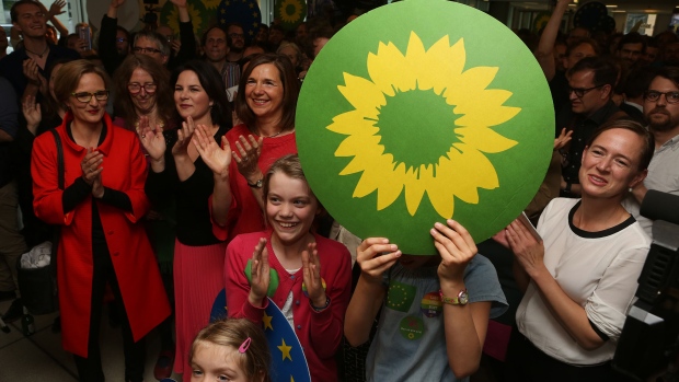 BERLIN, GERMANY - MAY 26: Supporters of the European Green party react to exit poll results indicating 22% of votes in their party's favor in European parliamentary elections on May 26, 2019 in Berlin, Germany. Today is the last day voters across the European Union are voting to determine the distribution of the current 751 seats of the European Parliament. Official results are expected for later tonight. (Photo by Adam Berry/Getty Images)
