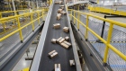 Packages ready for shipment move down a conveyor belt at the Amazon.com Inc. fulfillment center in Baltimore, Maryland, U.S., on Tuesday, April 30, 2019. 