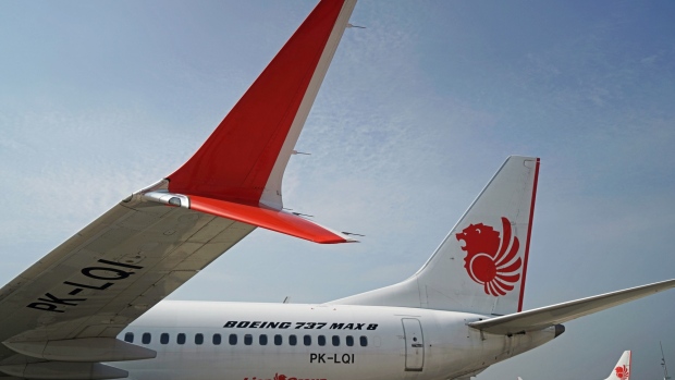 A grounded Lion Air Boeing Co. 737 Max 8 aircraft sits on the tarmac at terminal 1 of Soekarno-Hatta International Airport in Cenkareng, Indonesia, on Tuesday, March 15, 2019.