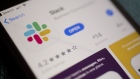 The Slack Technologies Inc. application is displayed in the App Store on an Apple Inc. iPhone in an arranged photograph taken in Arlington, Virginia, U.S. on Monday, April 29, 2019. Slack's filing last week confirms its plans to avoid a traditional public offering and instead list its shares directly on the New York Stock Exchange under the symbol SK. 