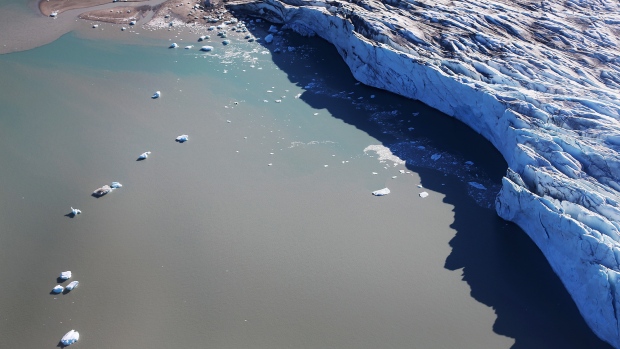 A glacial toe caused by melting grows near Ilulissat, Greenland, on July 15, 2013.