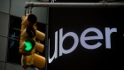A monitor displays Uber Technologies Inc. signage in front of Morgan Stanley headquarters in the Times Square area of New York, U.S., on Friday, April 26, 2019. U.S. stocks edged higher on better-than-forecast earnings while Treasury yields fell after data signaled tepid inflation in the first quarter. 