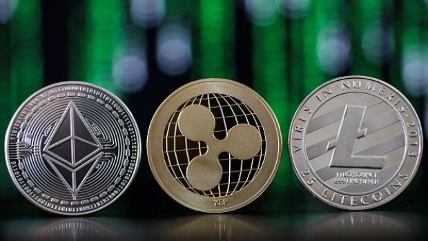 LONDON, ENGLAND - APRIL 25: In this photo illustration of the ethereum, ripple and litecoin cryptocurrency 'altcoins' sit arranged for a photograph on April 25, 2018 in London, England. Cryptocurrency markets began to recover this month following a massive crash during the first quarter of 2018, seeing more than $550 billion wiped from the total market capitalisation. (Photo by Jack Taylor/Getty Images)