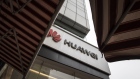 The Huawei Technologies Co. logo is displayed outside a store in Shanghai, China, on Tuesday, Jan. 29, 2019. 