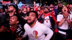 Fans reacts in the finals minute of the game in Jurassic Park as the Toronto Raptors