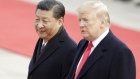 Xi Jinping, China's president, left, and U.S. President Donald Trump look on during a welcome ceremony outside the Great Hall of the People in Beijing, China.