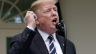 WASHINGTON, DC - MAY 22: U.S. President Donald Trump pretends to make a phone call while speaking about Robert Mueller's investigation into Russian interference in the 2016 presidential election in the Rose Garden at the White House May 22, 2019 in Washington, DC. Trump responded to House Speaker Nancy Pelosi saying he was engaged in a cover up. (Photo by Chip Somodevilla/Getty Images) 