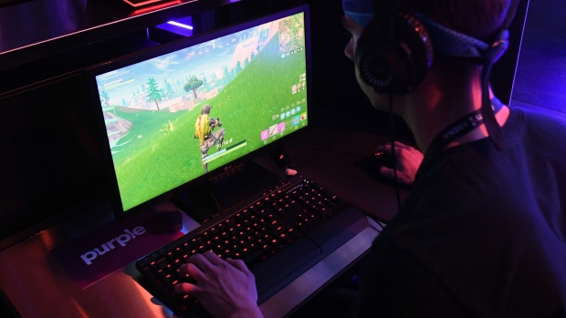 LAS VEGAS, NV - APRIL 21: Gamers play "Fortnite" against Twitch streamer and professional gamer Tyler "Ninja" Blevins during Ninja Vegas '18 at Esports Arena Las Vegas on April 21, 2018 in Las Vegas, Nevada. Blevins is playing against more than 230 challengers in front of 700 fans in 10 live "Fortnite" games with up to USD 50,000 in cash prizes on the line. He is donating all his winnings to the Alzheimer's Association. (Photo by Ethan Miller/Getty Images)