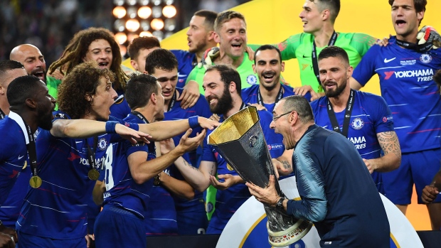 Maurizio Sarri celebrates with the Europa League Trophy following his team's victory in Baku, Azerbaijan on May 29. 