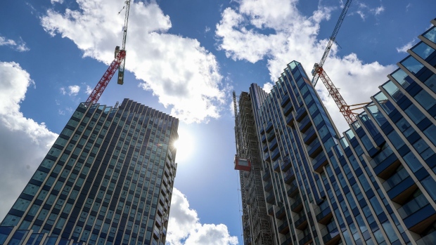 Construction cranes on the newly developed Upper Riverside residential development by London & Quadrant Housing Trust Ltd. (L&Q), on the Greenwich Peninsula in London, U.K., on Friday, April 26, 2019. The number of unsold homes under construction increased to 31,508 units as of March 31, the highest level recorded since Molior London began compiling the data a decade ago. 