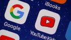 PARIS, FRANCE - APRIL 10: In this photo illustration, the logo of the Google and You Tube Kids applications are displayed on the screen of an Apple iPhone on April 10, 2018 in Paris, France. 