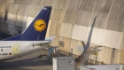 A Deutsche Lufthansa AG passenger jet stands on the tarmac at Frankfurt Airport as the airline's pilots continue their strike action, in Frankfurt, Germany, on Wednesday, Nov. 30, 2016. Lufthansa employees plan competing rallies at Frankfurt airport on Wednesday as some workers side with management to oppose a pilots strike entering its sixth day. 