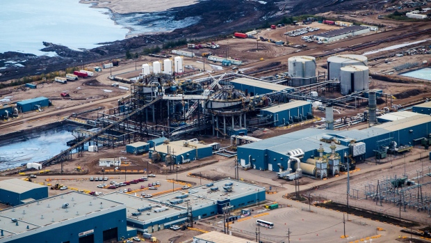 The Syncrude Canada Ltd. Aurora North mine is seen in this aerial photograph taken above the Athabasca oil sands near Fort McMurray, Alberta, Canada, on Monday, Sept. 10, 2018. While the upfront spending on a mine tends to be costlier than developing more common oil-sands wells, their decades-long lifespans can make them lucrative in the future for companies willing to wait. 