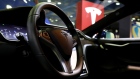 The steering wheel of a Tesla Inc. Model S P100D electric vehicle (EV) is seen at the EV Trend Korea exhibition in Seoul, South Korea, on Thursday, April 12, 2018. The exhibition runs through April 15. 