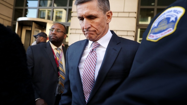 WASHINGTON, DC - DECEMBER 18: Former White House National Security Advisor Michael Flynn leaves the Prettyman Federal Courthouse following a sentencing hearing in U.S. District Court December 18, 2018 in Washington, DC. Flynn's lawyers accepted the judge's offer to delay sentencing for lying to the FBI about his communication with former Russian Ambassador Sergey Kislyak. Special Prosecutor Robert Mueller has recommended no prison time for Flynn due to his cooperation with the investigation into Russian interference in the 2016 presidential election. (Photo by Chip Somodevilla/Getty Images) Photographer: Chip Somodevilla/Getty Images North America
