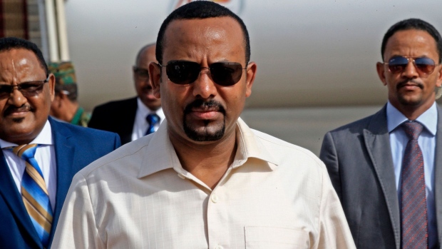 Ethiopia's Prime Minister Abiy Ahmed (C) arrives at Khartoum international airport on June 7, 2019.  Photographer: Ashraf Shazly/AFP/Getty Images